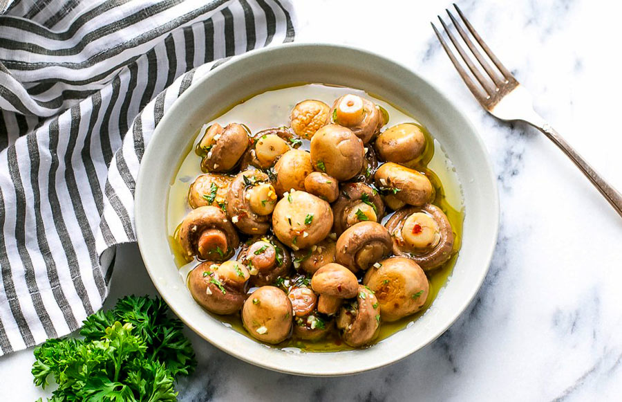 Шампиньоны маринованные в оливковом масле Шампиньоны в оливковом масле